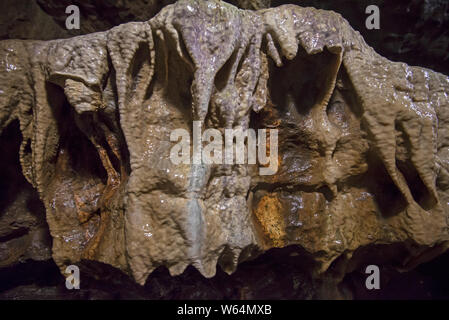 Closeup detail of geological rock formations in underground subterranean limestone cave cavern Stock Photo