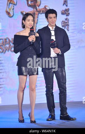 Chinese singer and actress Victoria Song or Song Qian, left, and Chinese-American singer and actor Wang Leehom attend a press conference for new movie Stock Photo