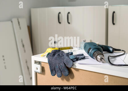 Electric tools and equipment diy instrallation kitchen at new home Stock Photo