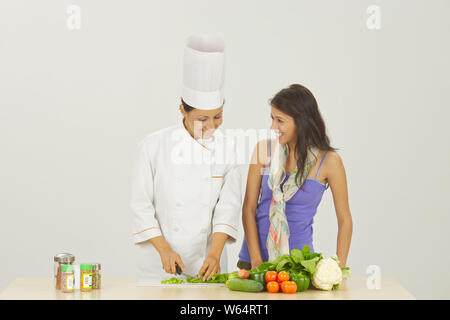 Female chef teaching in a training class