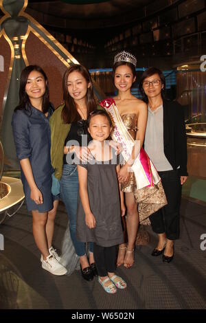 Amber Tang, second right, first runner-up of Miss Hong Kong Pageant 2018, poses with her family during a press conference in Hong Kong, China, 27 Augu Stock Photo