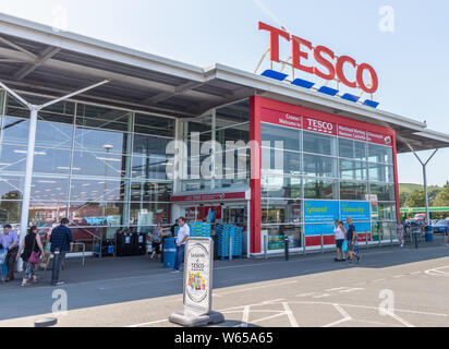 Newtown -  Wales / UK - July 23rd 2019 - Shoppers at Tesco supermarket entrance Stock Photo