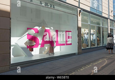 Womens fashion shop store window sale sign Coney Street York North Yorkshire England UK United Kingdom GB Great Britain Stock Photo