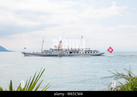 The oldest Belle Epoque restored vintage paddle steamboat Montreux cruising on Lake Geneva (lac Leman) from Montreux, Vaud, Switzerland during summer Stock Photo