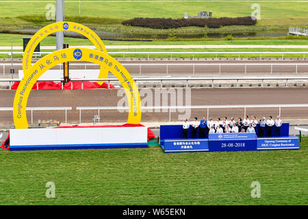 Officials and guests attend the opening ceremony of the Hong Kong Jockey Club Conghua Racecourse in Guangzhou city, south China's Guangdong province, Stock Photo