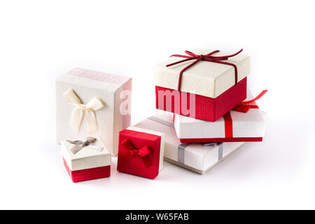 Some gift boxes isolated on white background. Christmas or birthday celebration concept. Stock Photo
