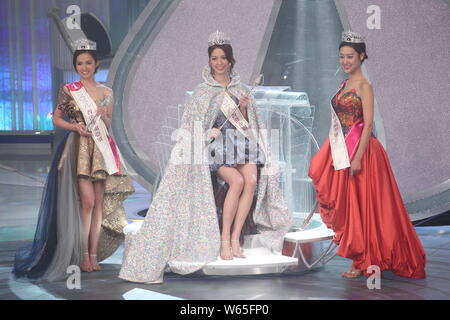 (From left) First runner-up Amber Tang, winner Hera Chan and second runner-up Sara Ting pose at the award ceremony during the finale of Miss Hong Kong Stock Photo