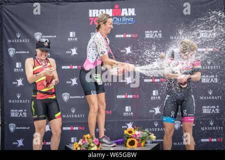 (From left) First runner-up Kate Bevilaqua of Australia, winner Kelsey Withrow of the United States and second runner-up Michelle Vesterby of Denmark Stock Photo