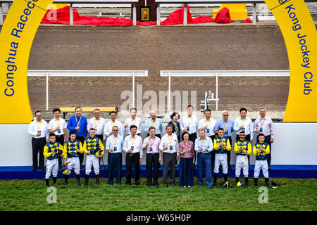 Officials and guests attend the opening ceremony of the Hong Kong Jockey Club Conghua Racecourse in Guangzhou city, south China's Guangdong province, Stock Photo