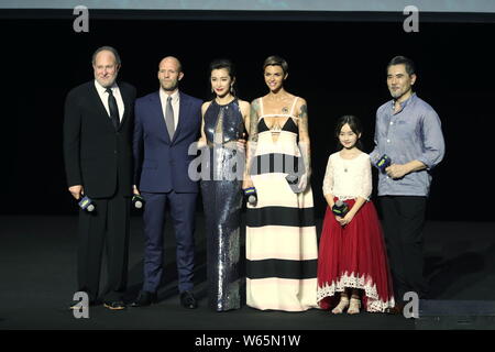 (From left) American film director and producer Jonathan Charles 'Jon' Turteltaub, English actor Jason Statham, Chinese actress Li Bingbing, Australia Stock Photo