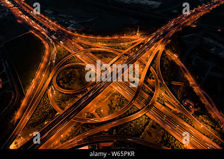 Night view of the crossings of an elevated highway in Shanghai, China, 3 June 2018. Stock Photo