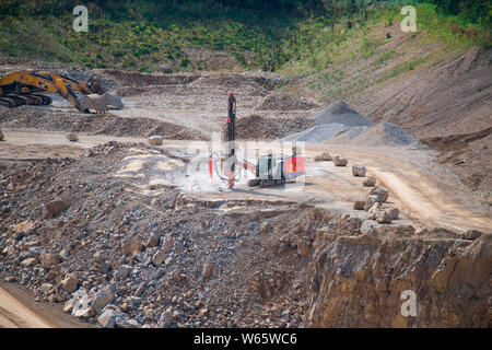 drilling for blowing up in chalk-pit, Wuelfrath, North Rhine-Westphalia, Germany, Europe Stock Photo