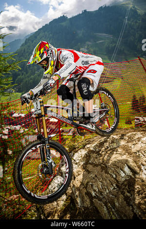 JULY 29, 2012 - VAL D'ISERE, FRANCE. UCI Mountain Bike World Cup. Greg Minnaar racing at the UCI Mountain Bike Downhill World Cup Stock Photo