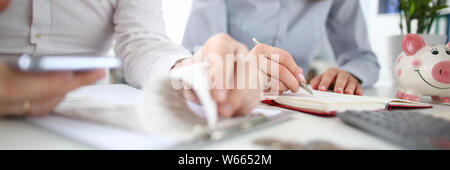 Young family man and woman checking Stock Photo
