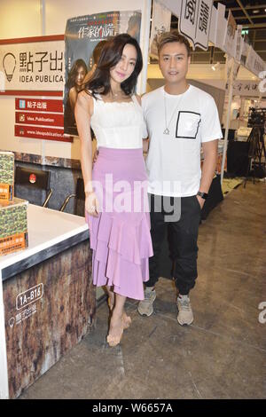 Hong Kong-based Japanese model Rina Matsuoka, also known as Linah, and Hong Kong actor Justin zhang attend a promotional event for 'Deception of the n Stock Photo