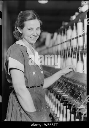 High Point, North Carolina - Textiles. Pickett Yarn Mill. Spinner - personality - woman picture Stock Photo