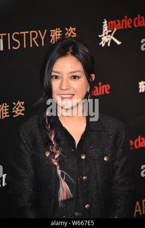 --FILE--Chinese actress Zhao Wei arrives on the red carpet for the Style China 2016 fashion event in Beijing, China, 9 December 2016.   Billionaire ac Stock Photo