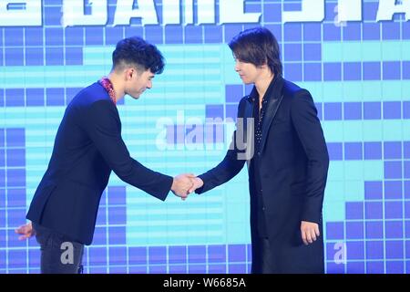 Taiwanese-British actor Rhydian Vaughan, left, and Japanese actor and singer Tomohisa Yamashita, also widely known as Yamapi, attend a press conferenc Stock Photo