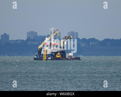 Sheerness, Kent, UK. 31st July, 2019. UK Weather: hot and sunny at midday in Sheerness, Kent but with clouds looming. Credit: James Bell/Alamy Live News Stock Photo