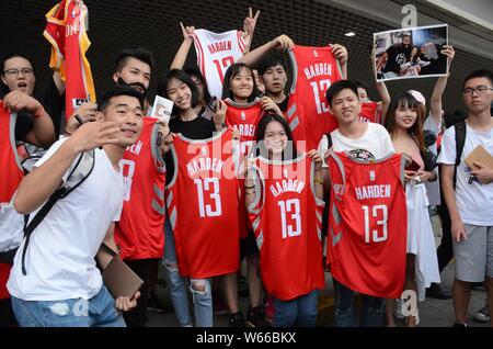 Chinese fans of NBA star James Harden of Houston Rockets hold up
