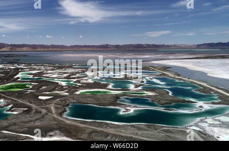 Aerial view of the Da Qaidam salt lake featuring the shape of emeralds in Haixi Mongol and Tibetan Autonomous Prefecture, northwest China's Qinghai pr Stock Photo