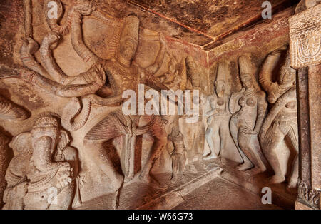 stone carving inside of Ravana Phadi Cave Temples, Aihole, Karnataka, India Stock Photo