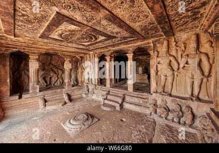 stone carving inside of Ravana Phadi Cave Temples, Aihole, Karnataka, India Stock Photo