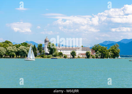 Fraueninsel, Frauenchiemsee on lake Chiemsee with boat, Sailboat, church, monastery. Bavaria, Bayern, Germany Stock Photo