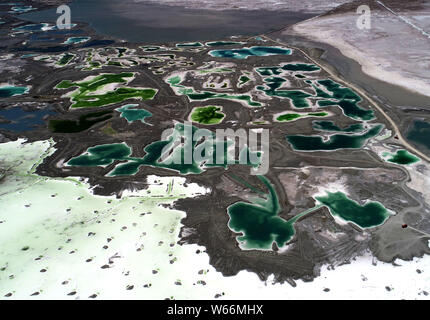 Aerial view of the Da Qaidam salt lake featuring the shape of emeralds in Haixi Mongol and Tibetan Autonomous Prefecture, northwest China's Qinghai pr Stock Photo