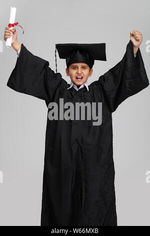Boy celebrating graduation degree Stock Photo