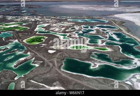 Aerial view of the Da Qaidam salt lake featuring the shape of emeralds in Haixi Mongol and Tibetan Autonomous Prefecture, northwest China's Qinghai pr Stock Photo