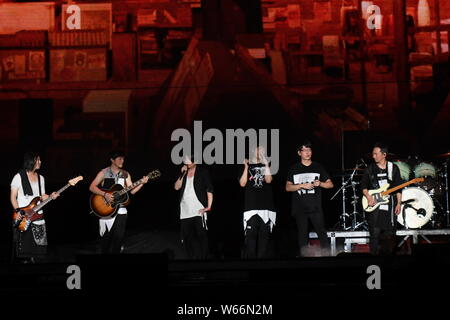 Japanese musician and singer Teruhiko Kobashi, better known by his stage name TERU, of rock band GLAY, and members of Taiwanese rock band Mayday perfo Stock Photo