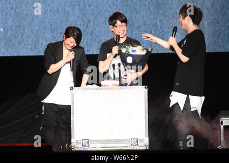 Japanese musician and singer Teruhiko Kobashi, better known by his stage name TERU, of rock band GLAY, and members of Taiwanese rock band Mayday perfo Stock Photo