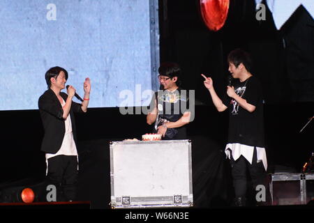 Japanese musician and singer Teruhiko Kobashi, better known by his stage name TERU, of rock band GLAY, and members of Taiwanese rock band Mayday perfo Stock Photo