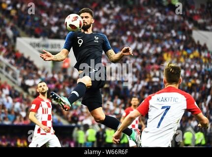 Olivier Giroud of France, center, challenges players of Croatia in their final match during the 2018 FIFA World Cup in Moscow, Russia, 15 July 2018. Stock Photo