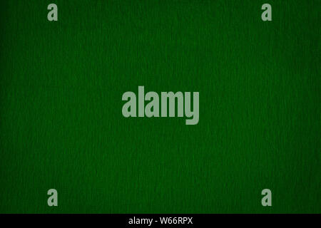 Texture of real dark green knitwear, textile background. Abstract background Stock Photo