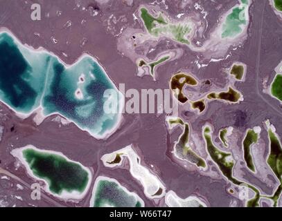 Aerial view of the Da Qaidam salt lake featuring the shape of emeralds in Haixi Mongol and Tibetan Autonomous Prefecture, northwest China's Qinghai pr Stock Photo