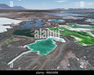 Aerial view of the Da Qaidam salt lake featuring the shape of emeralds in Haixi Mongol and Tibetan Autonomous Prefecture, northwest China's Qinghai pr Stock Photo