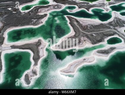 Aerial view of the Da Qaidam salt lake featuring the shape of emeralds in Haixi Mongol and Tibetan Autonomous Prefecture, northwest China's Qinghai pr Stock Photo