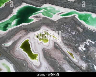 Aerial view of the Da Qaidam salt lake featuring the shape of emeralds in Haixi Mongol and Tibetan Autonomous Prefecture, northwest China's Qinghai pr Stock Photo