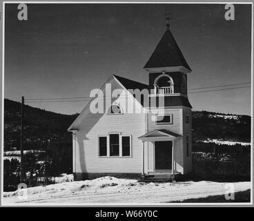 Landaff, Grafton County, New Hampshire. Like its town building, Landaff's church is fairly new, the . . .; Scope and content:  Full caption reads as follows: Landaff, Grafton County, New Hampshire. Like its town building, Landaff's church is fairly new, the original church was dilapidated and difficult to heat, and so was torn down. In hard winters the congregation (consisting of only 6 or 7 people when the roads are bad) meet in a basement room. Methodism began in the North around 1800 and grew during 3 generations. But by 1900 interest in the church and even in religion had begun to fade. Stock Photo