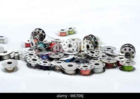 Sewing machine parts isolated on white background Stock Photo - Alamy