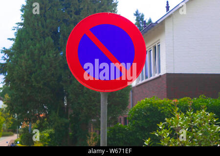 Dutch road sign: no parking on this side of the street Stock Photo