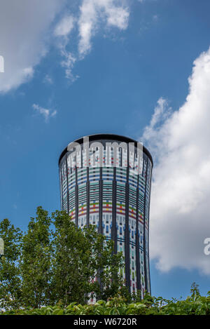 Milan, Italy; July 2019 : The Torre Arcobaleno or Rainbow Tower is a colorful water tower in the Italian city of Milan near the Garibaldi train statio Stock Photo