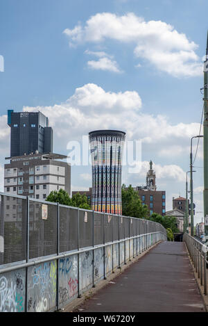 Milan, Italy; July 2019 : The Torre Arcobaleno or Rainbow Tower is a colorful water tower in the Italian city of Milan near the Garibaldi train statio Stock Photo