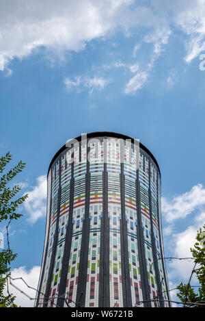 Milan, Italy; July 2019 : The Torre Arcobaleno or Rainbow Tower is a colorful water tower in the Italian city of Milan near the Garibaldi train statio Stock Photo