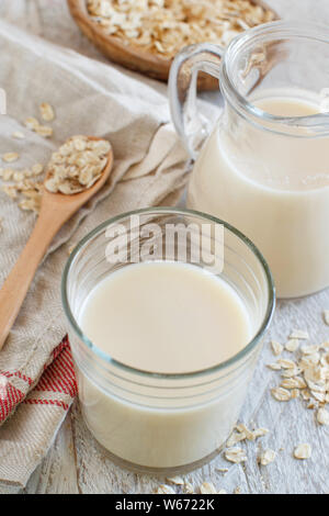 Vegan oat milk, non dairy alternative milk in a small bottle close up Stock Photo
