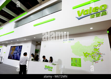 --FILE--A visitor is seen at the stand of French car parts supplier Valeo during the 16th Shanghai International Automobile Industry Exhibition, known Stock Photo