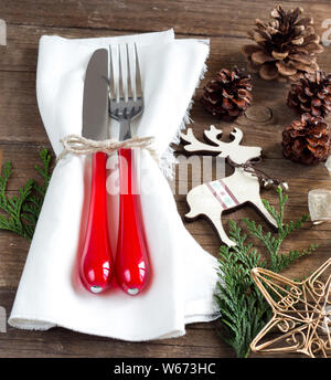 Festive table setting with  Christmas decorations Stock Photo