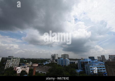 Kolkata, India. 31st July, 2019. Monsoon clouds over the Sector V, Salt Lake city. In this year the rainfall deficit is around 65% in the South Bengal Stock Photo